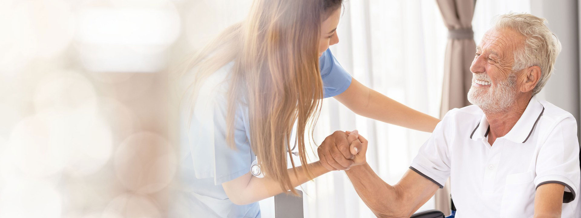 Care professionals supporting an older adult